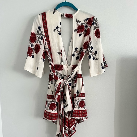 Boutique Floral Romper with Open Back - Picture 3 of 5